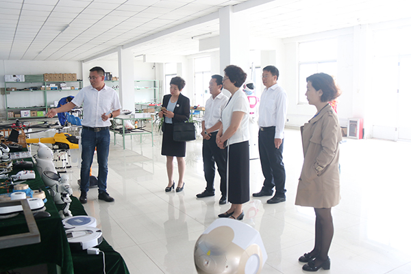 Warmly Welcome Leadership of City Center for Educational Technology to Visit China Coal Group for Inspection