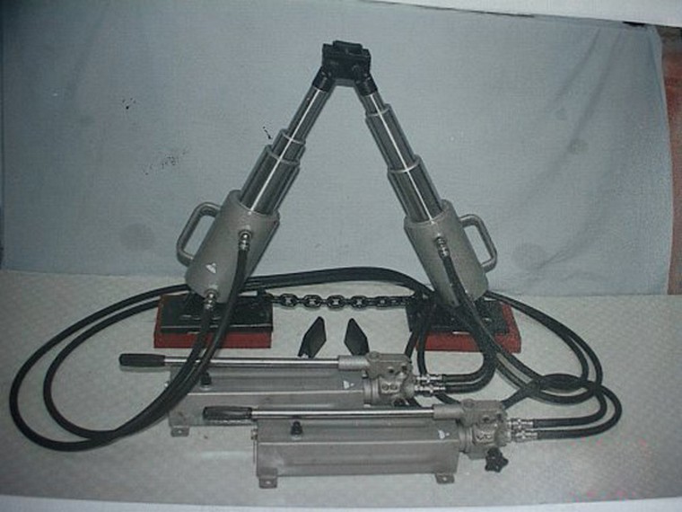 Hydraulic pressure reset machine